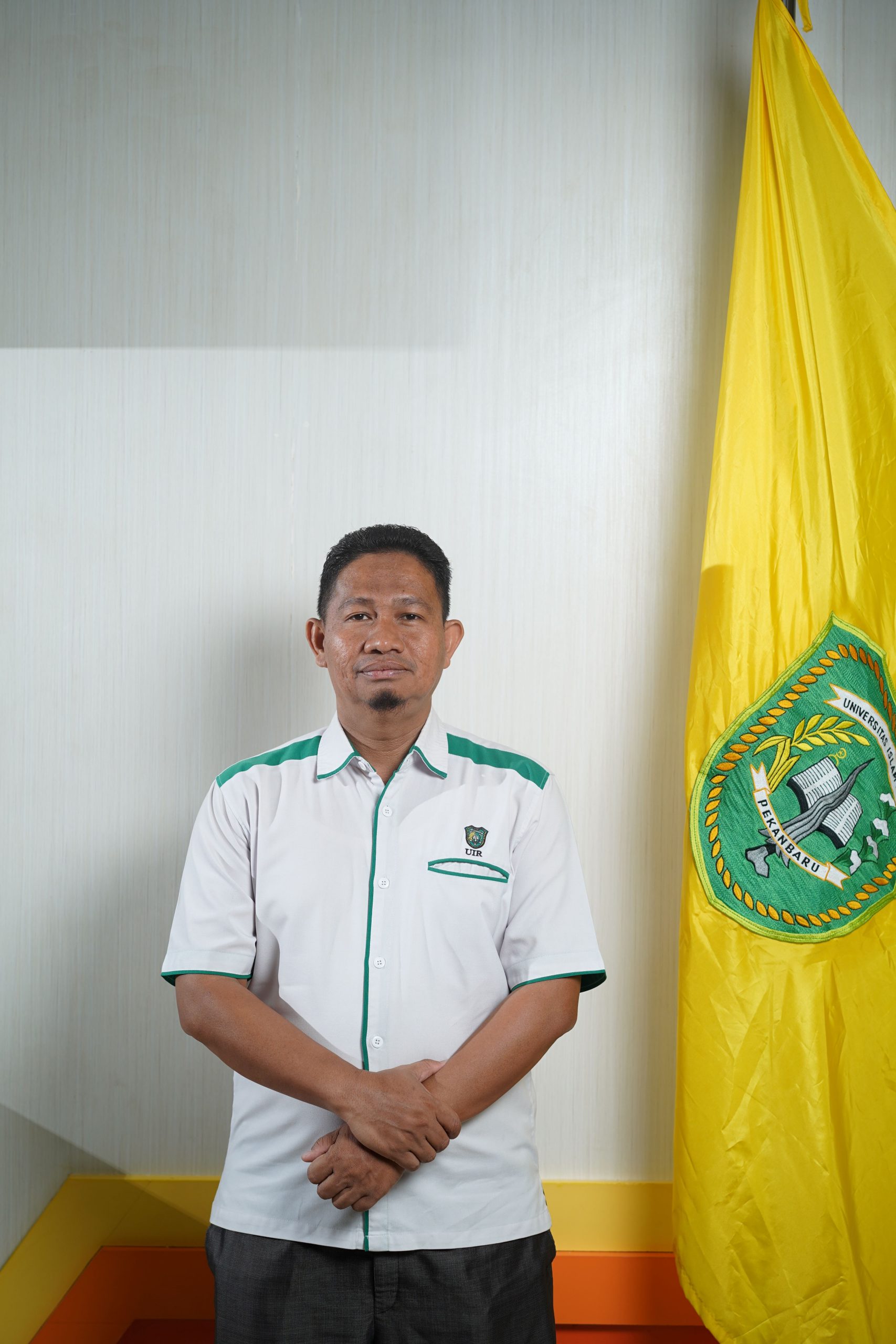 Dr. Azmansyah, S.E., M.Econ., CRP.